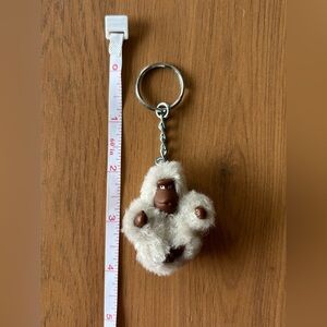 Kipling beige furry monkey gorilla keychain charm Katie